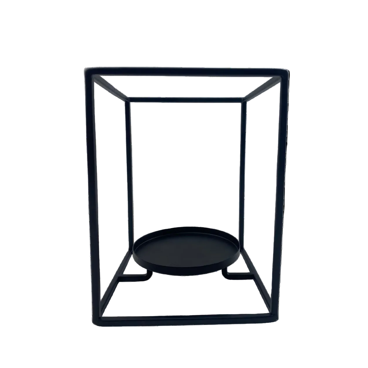 Black metal candle holder with a round base on a white background